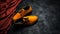Mysterious Elegance: Men\\\'s Orange Shoes On Black Cloth