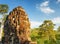 Mysterious face-tower of ancient Bayon in Angkor Thom, Cambodia