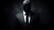 The Mysterious Faceless Man In A Black Suit