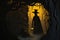 A mysterious figure in a top hat and cloak, holding a vintage lantern in the dark