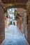 Mysterious gateway among historic buildings in Venice