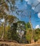 Mysterious gopura on woods background, Cambodia