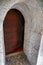 Mysterious historic medieval rounded entrance door
