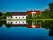 Mysterious house reflected in water