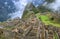 The Mysterious Incan Citadel of Machu Picchu in the mist, Archaeological site in Cusco Region, Urubamba Province, Peru