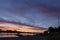 A mysterious landscape with a pier after sunset at Kalwa lake