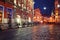 Mysterious narrow alley with lanterns in an old European city