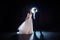 Mysterious and romantic meeting, the bride and groom under the starry sky. Hugs together. Man and woman, wedding dress.