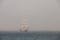 Mysterious sailing ship surrounded fog