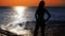 mysterious silhouette girl at beach during sunset