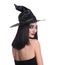 Mysterious witch wearing hat