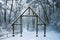 Mysterious wooden door in a forest in winter