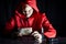 Mystery man in red hoodie holding euro banknote