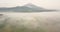 Mystic Aerial reverse flight over tropical landscape