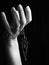 Mystic black & white female hand with gothic chain