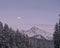 Mystic Peak and Mount Ishbel with moon as dusk in Banff National Park, Canada