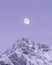 Mystic Peak and Mount Ishbel with moon as dusk in Banff National Park, Canada