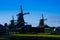 Mystic scene with air mill in Zaanse Schans, Holland, Europe backlit.