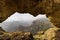 The Mystic View through Ventana del Nublo Rock Arch