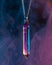 Mystical crystal pendant glowing in a colorful haze