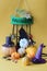 Mystical Halloween decorations, burning candles on a bright orange background