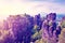 Mystical landscape with rocks near Rathen, Germany, Europe Sachsische Schweiz