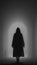 A mystical silhouette of a woman in a hooded cloak in an arch. A horror woman. Black and white image. Generated AI.