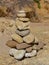 Mystical stone piles and figures on the beach in Albufeira, Algarve - Portugal