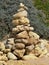 Mystical stone piles and figures on the beach in Albufeira, Algarve - Portugal