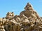 Mystical stone piles and figures on the beach in Albufeira, Algarve - Portugal