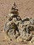 Mystical stone piles and figures on the beach in Albufeira, Algarve - Portugal