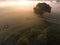 Mystical Sunrise Drone View of Lush Green Landscape