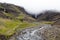 Mystical view of Hengifoss waterfall in a cloud, east Iceland. Summer hike