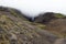 Mystical view of Hengifoss waterfall in a cloud, east Iceland. Summer hike