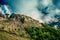 Mystical view on the Machu Picchu city ruins covered with dramatic clouds.