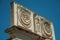 Mythological face carved in marble block at the Roman Forum in Merida