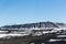 Myvatn volcano with clear blue sky background during winter season