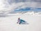 Mölltaler Gletscher - A snowboarder girl sitting on the slope