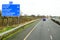 N6 road to Dublin, Ireland - 21.01.2022: Highway and traffic to the capital of Ireland from Galway. sign with distance to Dublin