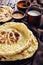 Naan, indian flatbread, pita on a table