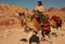 Nabateans on camels in ancient capital of Nabatean kingdom in Petra Jordan. Camels as means of transportation. Petra, Jordan -