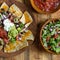 Nacho Cheese Tortilla chips with chili and salsa