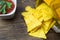 Nachos corn chips with classic tomato salsa. Fresh cold beer is perfect with savory snacks.