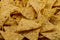 Nachos, fresh tortilla chips, background. Close-up