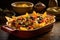 nachos topped with beans, corn and olives in baking dish