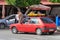 NADOR, MOROCCO - MAY 22, 2017: Local small red taxi car in center of Nador. Such cars are used in Morocco to move passengers