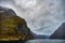 Naeroyfjord mountains under a cloudy sky in Norway