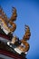 Naga sculpture on the roof temple