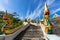 Naga snake on authentic staircase to Wat Kaew Korawaram white temple