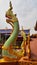 The naga statue on the staircase at the temple in the temples of Thailand, beautifully decorated.